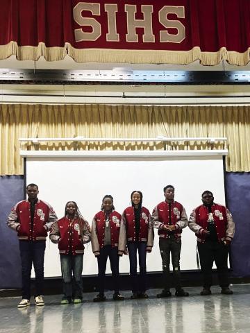 SEVEN SICILY ISLAND HIGH SCHOOL ATHLETES received their letterman jackets this week. They are pictured from left to right: Edward Stevenson, Raven West, Delilah Dunbar, Darrianna Smith, Terry Douglas, Isaac Smart, and Akeria Tolliver (not pictured).
