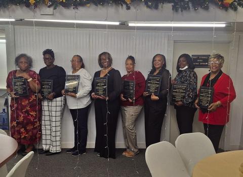 FROM LEFT TO RIGHT: Josie Ford, Helen Payne, Rosetta Griffin, Linda Kerry, Angela Hayes, Tawanda Wilkerson, Martha Thomas, and Dorothy Oliver - Director.