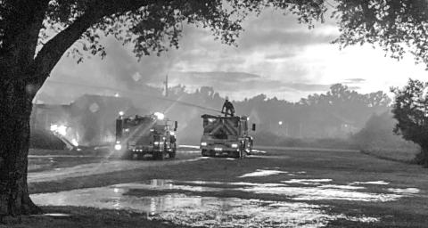FIREFIGHTERS BATTLE a fire at Ferriday Methodist Church