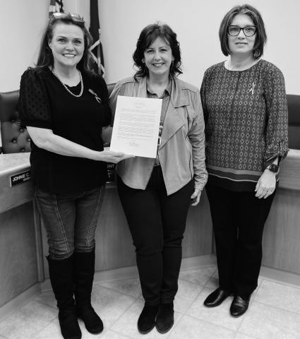 DOAN MORAN, Tammie Edwards and Tonya Salter-Johnson pictured above