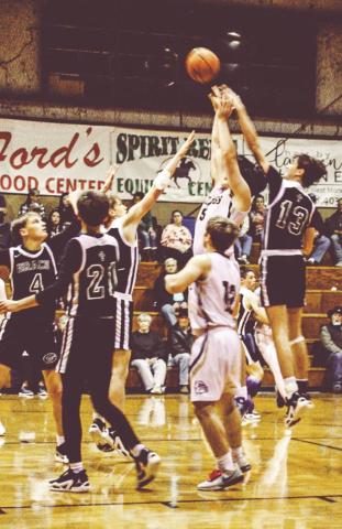 LAINE DUPUIS shooting. Carter Pentecost #12 and Tate Tiffee on left #34.