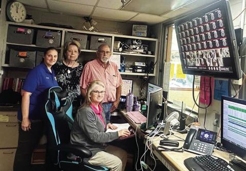 E-911 PERSONNEL pictured above are: seated, Dispatcher Sarah Brannon, standing left to right are, Dixie Jordan, E-911 Director Frankie Tolar, and Catahoula Parish OHSEP Director Ellis Boothe.