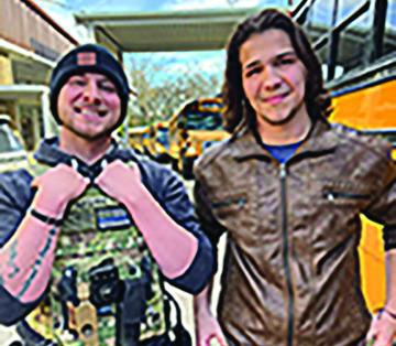Officer Bo Abshire and Zackary Adams