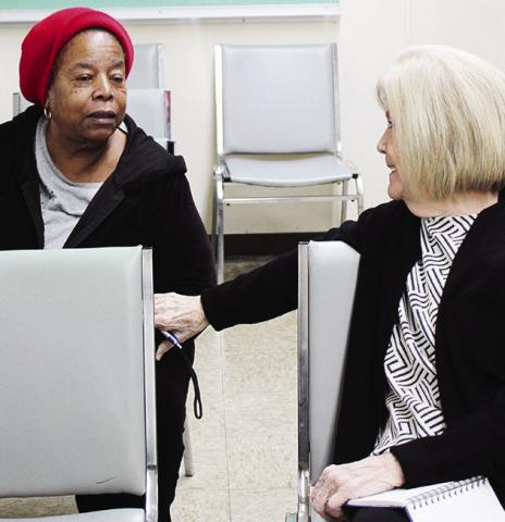 JONESVILLE RESIDENT Josephine Jones (left) speaking with Tommie Seaton with Sen. Cassidy’s office.