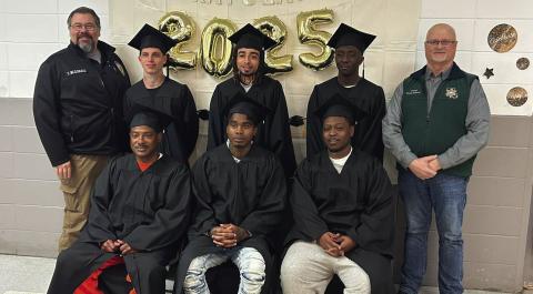 WARDEN TREVOR McDonald, CCC graduating class and Sheriff Toney Edwards pictured above.