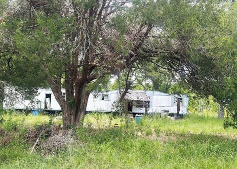 This blighted property is located on Cantwell Road