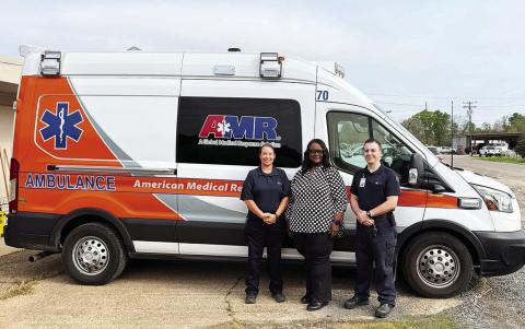 AMR EMT Tracy Goad, Jonesville Mayor Loria Hollins, and AMR Paramedic Ronnie Hill