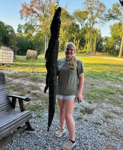 HEIDI CRAWFORD’S first alligator she killed on October 13 2024 at the Dewey W. Wills Wildlife Management Area. It was six feet and eight inches long and weighed 65 pounds.