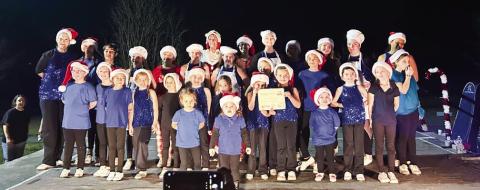 LINEDANCERS WITH The Talent Academy/ Glory Bound Cloggers/ Dance With Me won first place at the Jonesville Christmas parade are pictured above