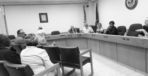 POLICE JURY members pictured discussing first responder tax exemption with Tax Assessor Matt Taylor