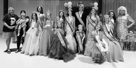 LILLY HARVEY standing with the Mille Mattered Pageant winners.
