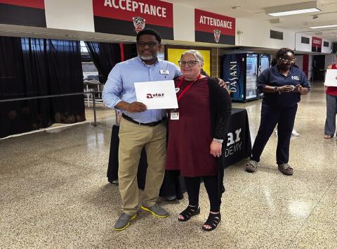 STEPHANIE POSEY standing with Star instructor.