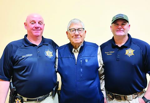 Investigator Ben Adams, Coroner Raymond Rouse, and Investigator Dewain Littleton.