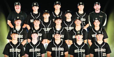 HHS 2025 BULLDOG BASEBALL TEAM: Bronx Dill #9, Laine Dupuis #15, Dominic Stott #26, Landon Wiley #99, Carter Pentecost #12, Bryce Butts #33, Jake Book #2, Kaleb Stewart #14, Maddux Trisler #3, Braden McGuffee #25, Tate Tiffee #32, Eden Dulworth #4, Head Coach Luke Pentecost, Assistant Coach Ty White, and Assistant Kevin Trisler.
