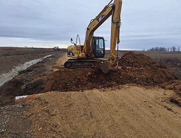 The Catahoula Parish Police Jury changing out 30x60 culverts on Doty Road